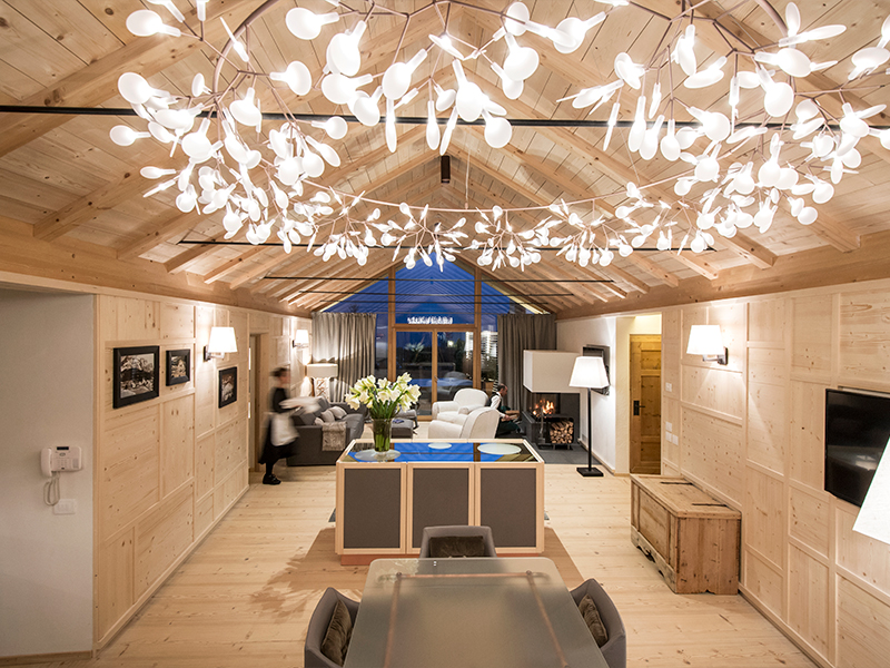 Chalet Zeno has three double bedrooms, living and dining areas, a kitchen, and a private garden oriented towards the village and the pine forest. ( Image Credit: Aman)