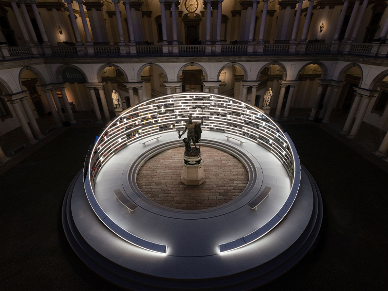 The library serves not merely as a keeper of knowledge, but as a transmitter of it—alive, evolving, and deeply attuned to the touch of those who pass through. (Image Credits: Monica Spezia) 