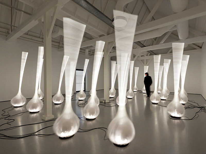 Portrait Milano’s courtyard, Drift Us by Studio DRIFT for Audi manifests as a choreography between human presence and kinetic response. (Image Credits: Ronald Smits) 