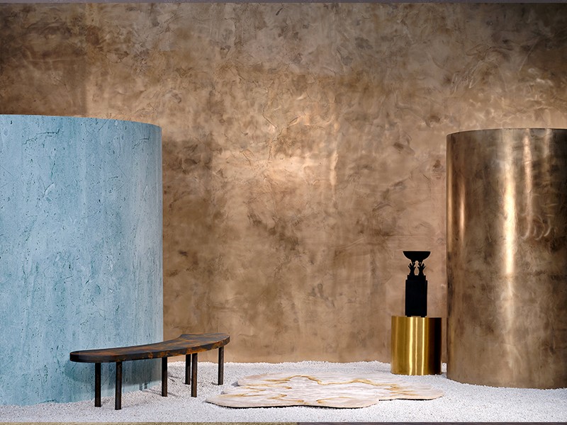 A symphony of hues comes together in The Hand of Adam side table by Atelier Ashiesh Shah, Drumstick table by Hatsu, and Kenna Ivory Gold rug by Hands Carpet. (Image Credits: Courtesy of Asian Paints)