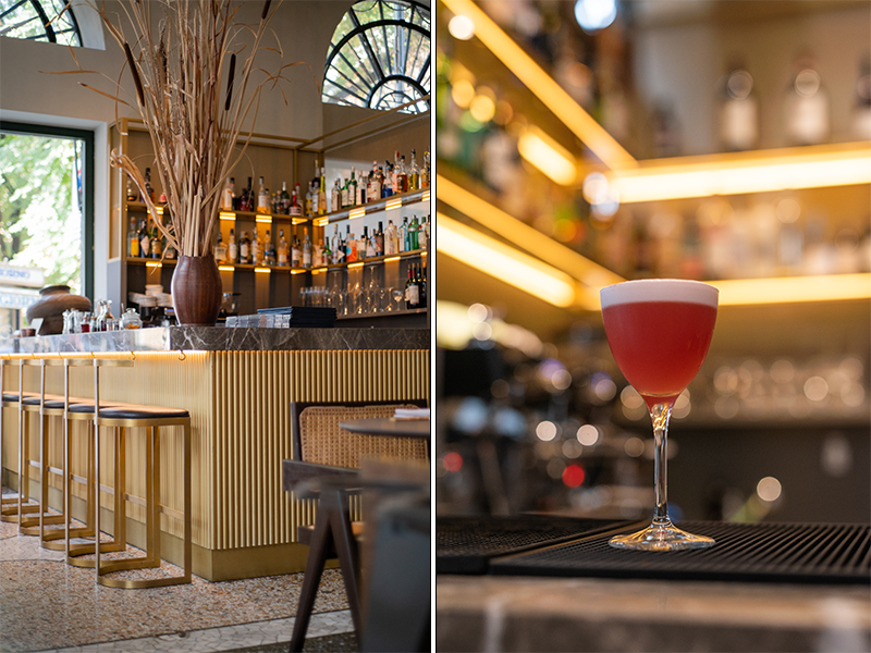 The central bar area with a marble countertop and gold-accented high chairs is the highlight of the decor at Cittamani. (Image Credit: Cittamani)