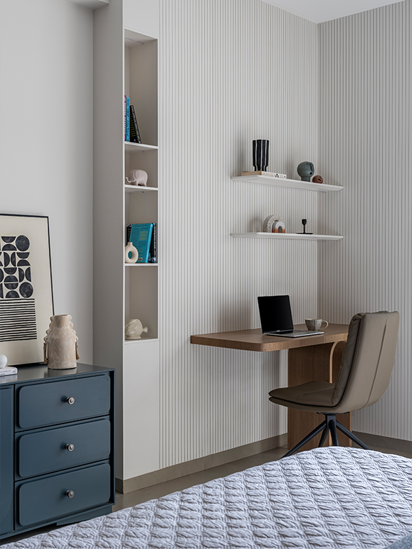 A compact work-from-home set is a practical use of the corner of the master bedroom (Image Credit: Noaidwin Sttudio)
