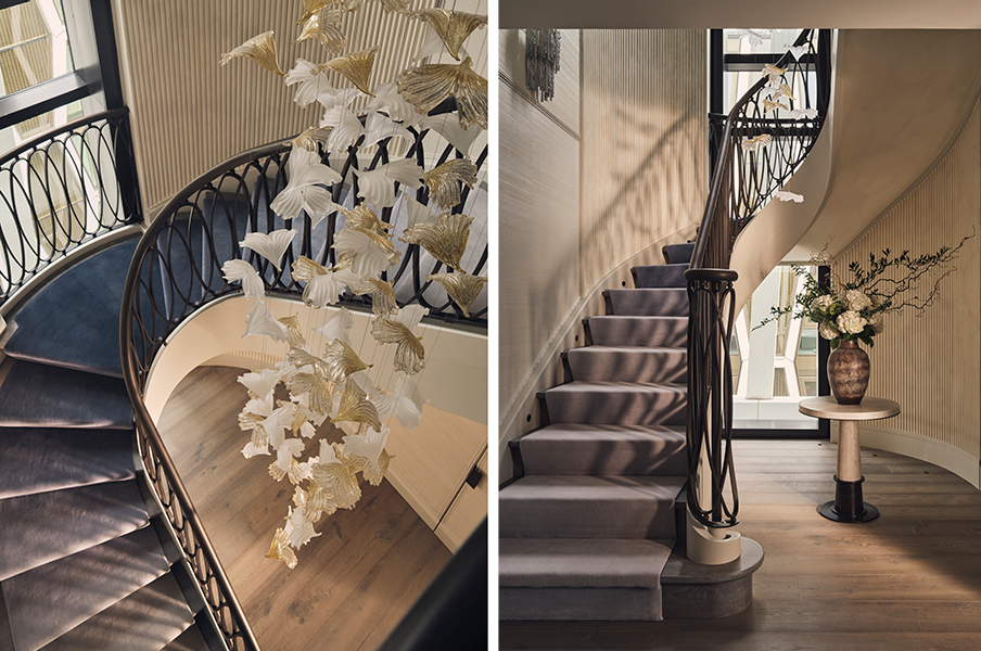 An ombré stair runner meets European Oak parquet flooring by Barc, framed by reeded panelling awash in natural lime paint from Bauwerk Colour, beneath a custom-designed fluttering crystal chandelier. (Image Credits: Nick Rochowski)