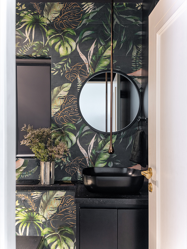 The bathroom features printed tiles from Turquoise The Bath Couture, fittings from Aquant India and the COB lights are from Philips. (Image Credits: Kuber Shah) 