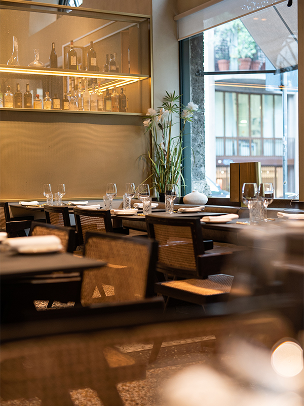 The rattan-infused furniture, wooden accents, and ceramics add warmth to the interiors of Cittamani. (Image Credit: Cittamani) 