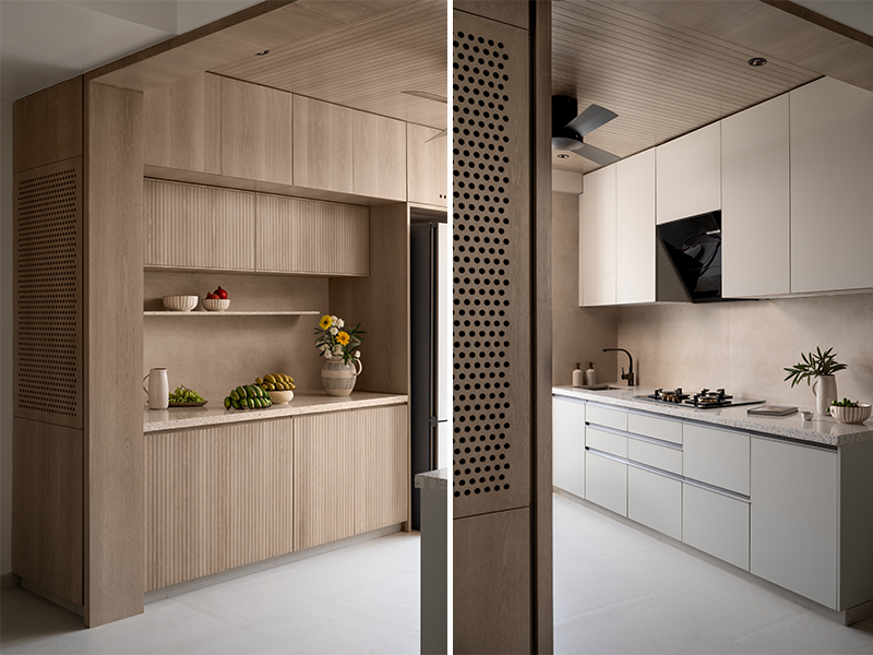 A sand-coloured, vitrified tile backsplash marries beautifully with the pale cream and grey cabinets in this kitchen designed by Nashik-based firm LADLAB. (Image Credits: Nayan Soni Photography) 