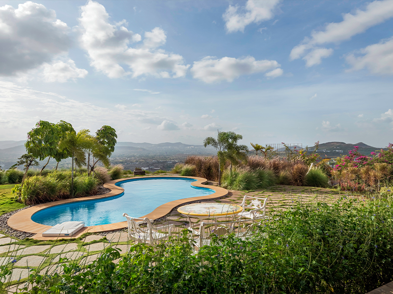 The sinuous form of the pool softens the rugged terrain, creating a tranquil oasis where water, stone, and landscape exist in perfect harmony (Image Credits: Retiesh Ramaiyah)
