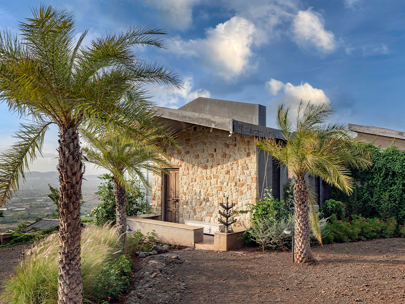 A play of textures and earthy tones lends an understated elegance, blending contemporary sensibilities with rustic charm (Image Credits: Retiesh Ramaiyah)