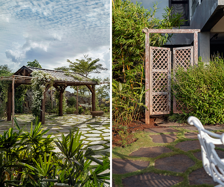A charming weathered wooden gate with lattice panels, repurposed from a jailwood door frame, adds a touch of history and rustic elegance to the entryway. (Image Credits: Retiesh Ramaiyah)
