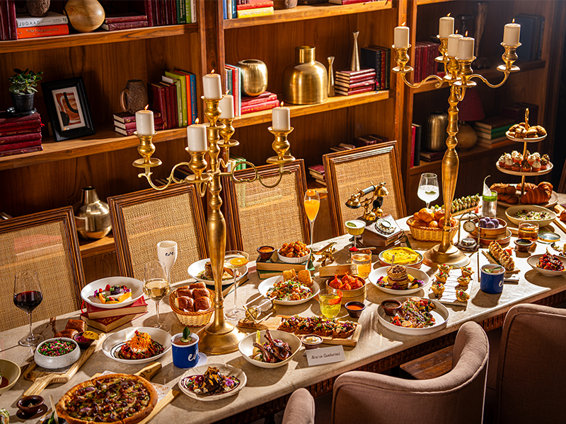 A 12-seater dining around built-in bookshelves is the private dining space that sets the mood for the elegance of the writer’s bar dining concept. ( Image Credit: Eve Santacruz)