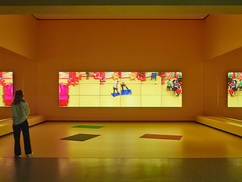 ‘A Bigger Space for Dancing,’ by David Hockney 2012, 18 digital videos synchronised and presented on18 screens to compose a single work of art.. (Image Credit: Fondation Louis Vuitton / Marc Domage)
