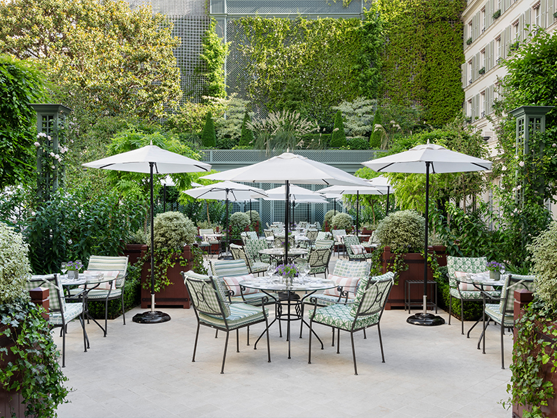 Lady Arabella Lennox-Boyd lends the courtyard garden, ​​Le Jardin Français, a refined pastoral charm, where sculpted topiaries meet flowing grasses in a countryside ease. (Image Credit: Vincent Leroux) 
