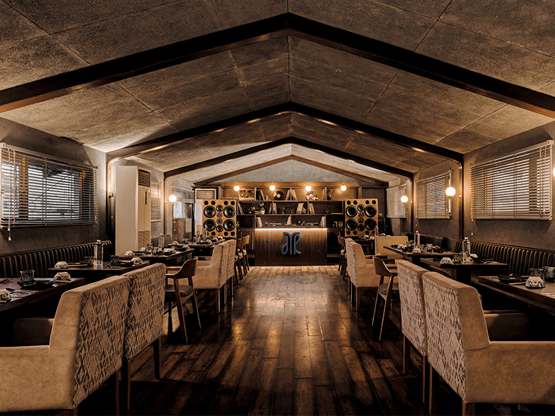 The Listening Room, designed by Munro Acoustics, features custom-built tower speakers and a perforated treated ceiling fitted with a layer of 'HMFill'—a 3d fibrous structure typically reserved for high-end Hi-Fi studios. ( Image credit: The Dimsum Room)