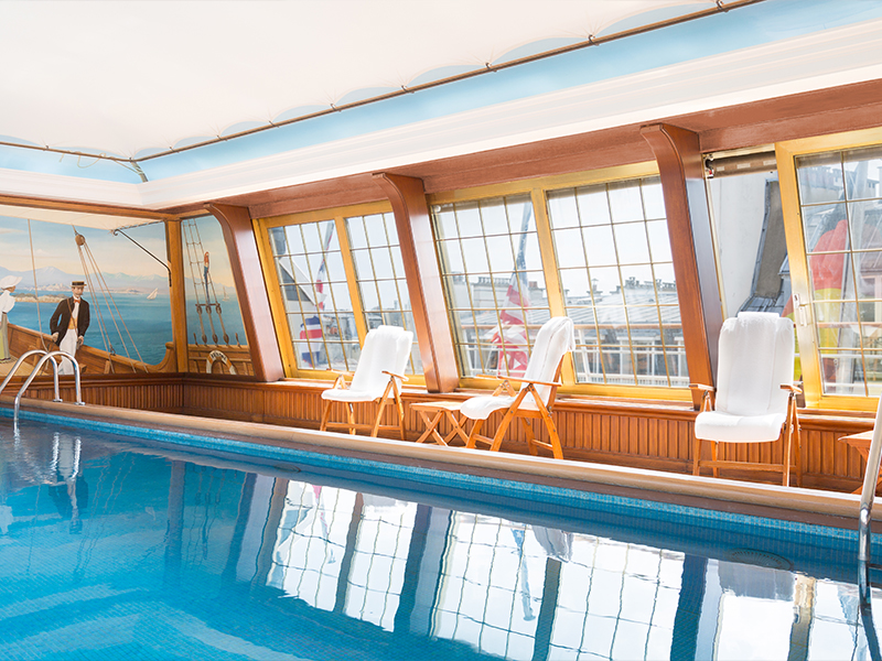 Perched on the 6th floor and dreamt up in the 1980s by architect Ceasar Pinnau, the temperature-controlled indoor pool channels the spirit of a 1920s luxury yacht. ( Image Credit: Claire Cocano ) 
