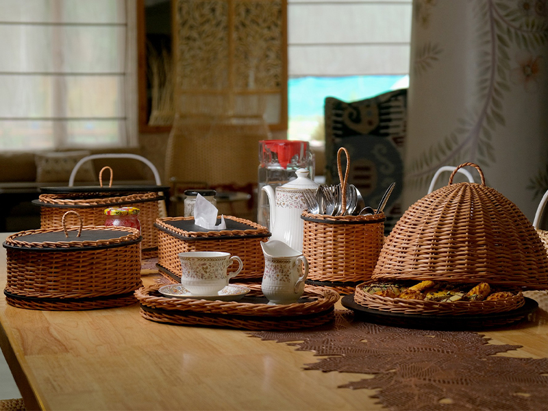 Their wicker collection fuses craftsmanship with modern precision through laser-cut detailing. (Image Credits: Studio Kilab) 