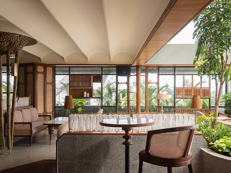 Vernacular architecture, indoor plants, and a warm colour palette make Nakhra a cosy haven. (Image Credit: Nakhra) 