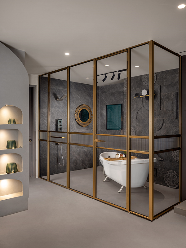 The shower enclosure section exudes a contemporary vibe with a dash of vintage elegance. (Image Credits: Courtesy of Parallel)