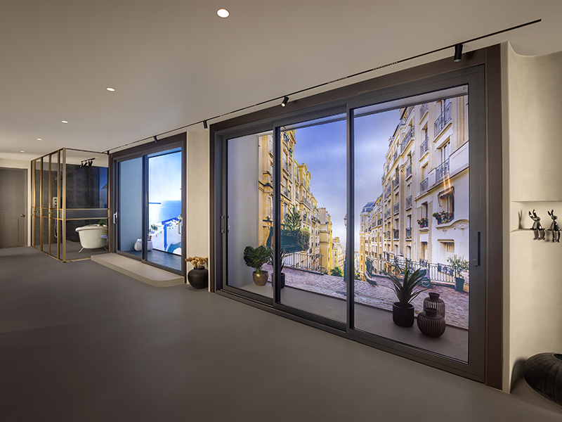The windows with digital screens add a futuristic vibe to the space. (Image Credits: Courtesy of Parallel)