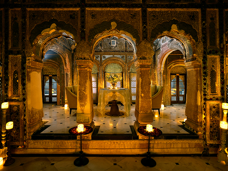 Intricate frescoes grace the ceilings, while walls lined with Aleppo mirrors come alive under the flicker of candlelight, revealing their true, dazzling brilliance. ( Image Credit: Ran Baas- The Palace Hotel)
