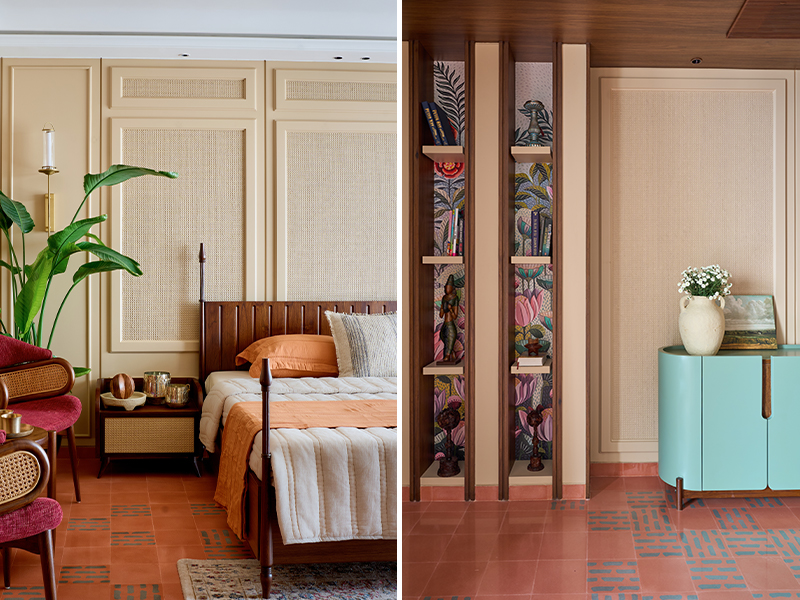 Left: Cane-panelled walls, terracotta flooring, and a striking Indian artwork set the tone in the master bedroom, where earthy textures meet bold colour accents in a serene, crafted ensemble. Right: A built-in shelving niche lined with vibrant botanical wallpaper pairs with a custom powder-blue cabinet and cane-panelled walls, bringing softness and modern contrast to the terracotta-patterned flooring (Image Credits: Rohit Mendiratta) 