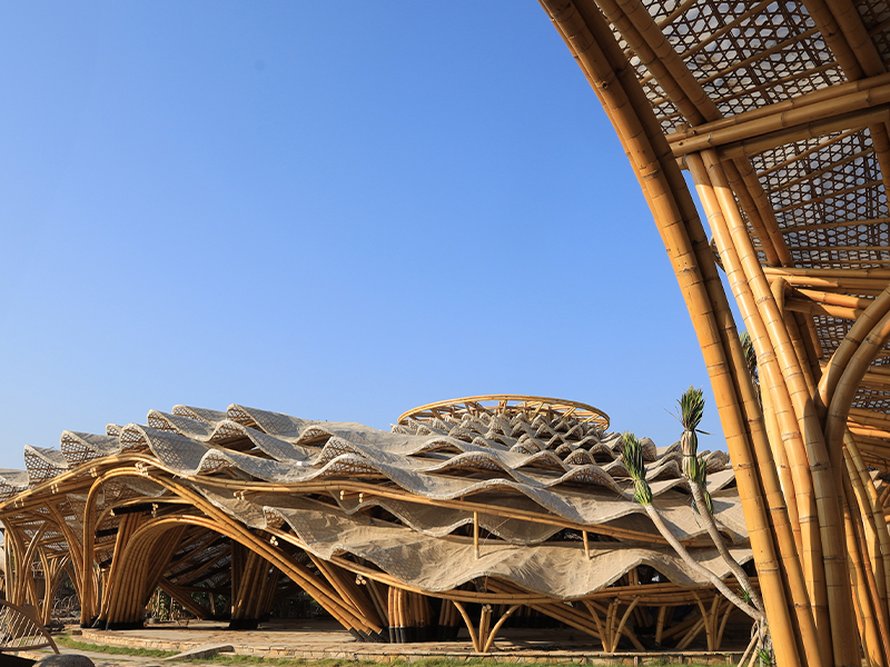 Nuanu Creative City in Bali showcases striking bamboo architecture, most notably seen in the sculptural forms of Luna Beach Club and the iconic THK Tower.. (Image Credits: Nuano Creative City)
