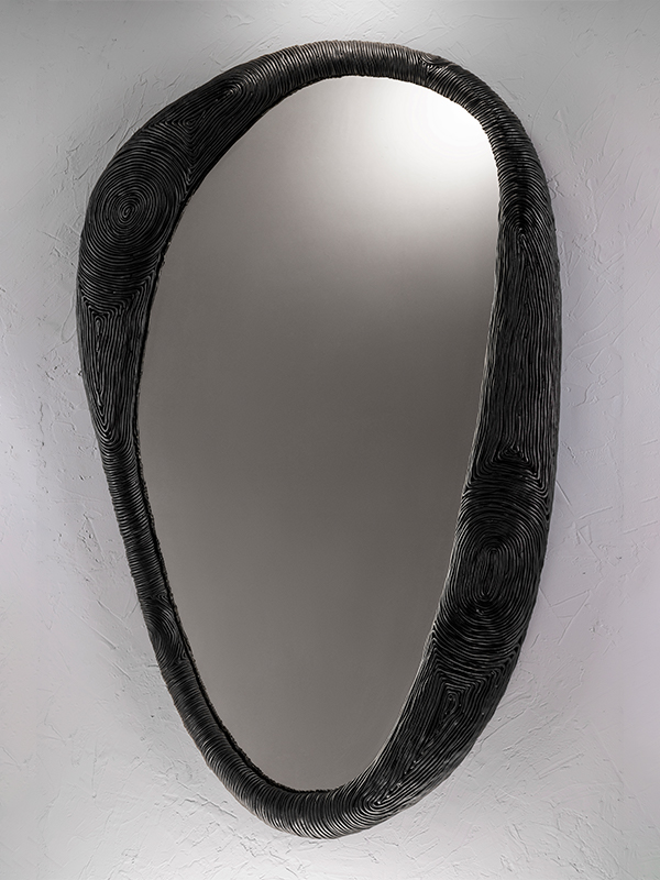 The Eraya Mirror by Shailesh Rajput Studio is inspired by cave drapery, the most notable formation in a cave. Price: ₹ 45,000 (Image Credits: Apoorva Salkade)