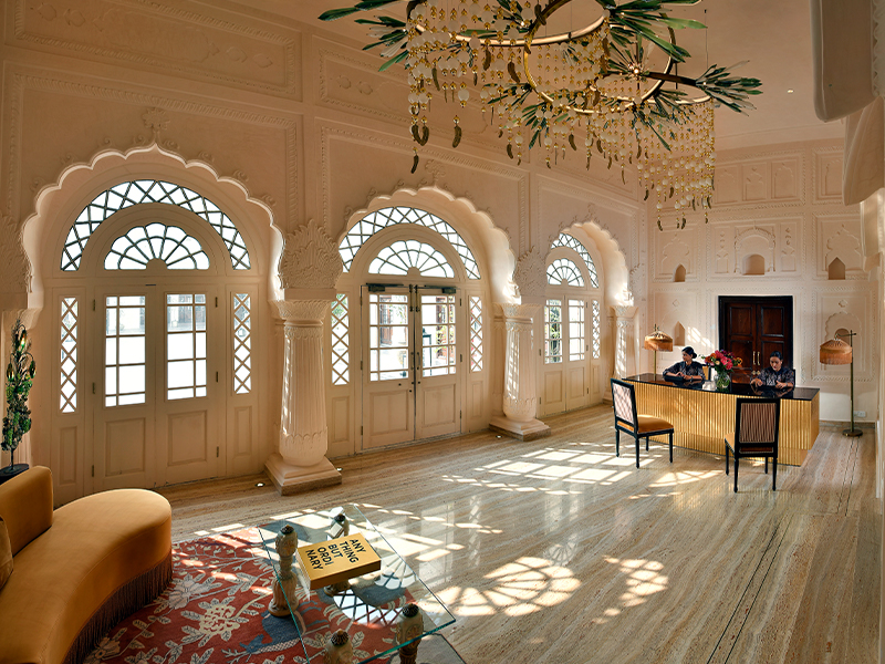 The dual reception areas evoke contrasting moods, both graced by stunning Klove Studio chandeliers, handblown by master glass artisans. (Image Credit: Ran Baas- The Palace Hotel )