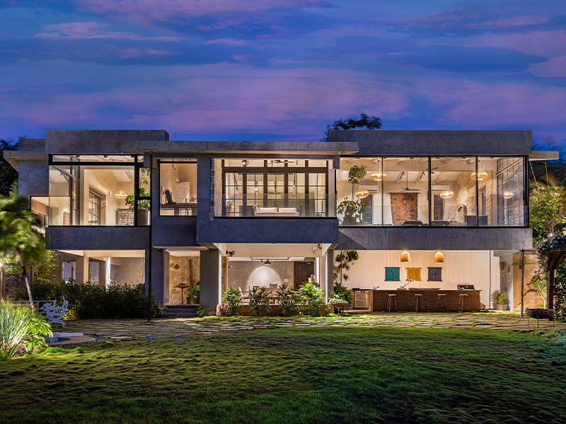 The glass facade and alfresco spaces cast an illusion of the home being completely one with nature. (Image Credits: Retiesh Ramaiyah)