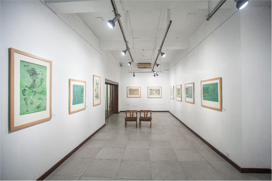 Set against pristine interiors and elegant grey tiles, Akar Prakar offers a refined stage for modern and contemporary South Asian art. (Image Credits: Courtesy of Akar Prakar) 