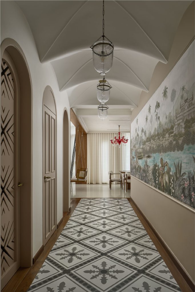 At Villa 16, designed by Insitu Design Studio, the entryway passage with groin vaults and stone flooring with wallpapers from Kalkaari Haath wallpaper. (Image Credits: Yadnyesh Joshi) 