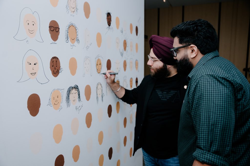 Guests Amandeep Singh Anand from Fima Carlo Frattini and Prakhar Prem Kumar Agarwal from Foremost Marbles engaging at the after-party photo op in frame. (Image Credits: Design Pataki) 