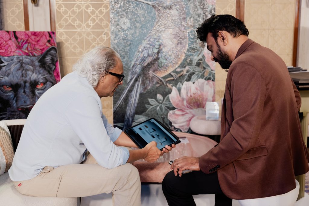 An engaging conversation between Zubin Master, Design Matrix and Pratik Mehta, founder of INHOUZ, captured in a candid moment of exchange and collaboration. (Image Credits: Design Pataki) 