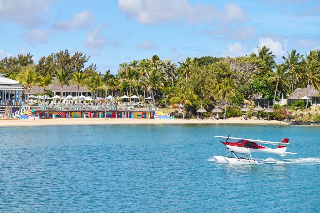 For an unforgettable arrival, touch down at the resort in a seaplane, skimming over turquoise waters (Image Credit: LUX* Grand Gaube) 