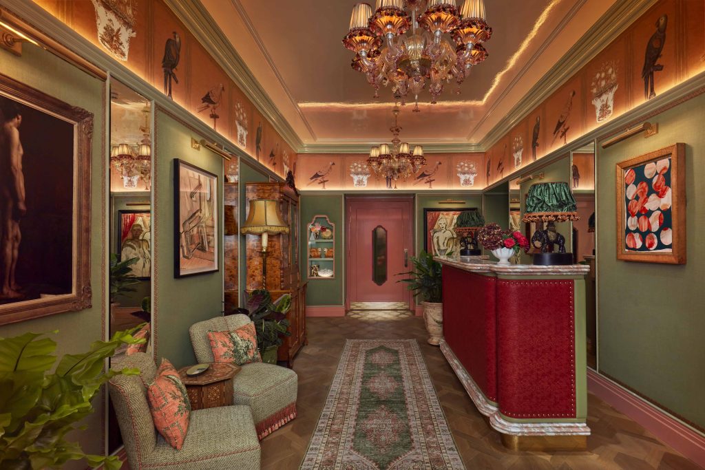 The reception lounge is a maximalist dreamscape—an immersive vision brought to life by designer Martin Brudnizki and a founding team obsessively involved in every detail, from the art on the walls to the design of the teaspoons. (Image Credit Broadwick Soho) 
