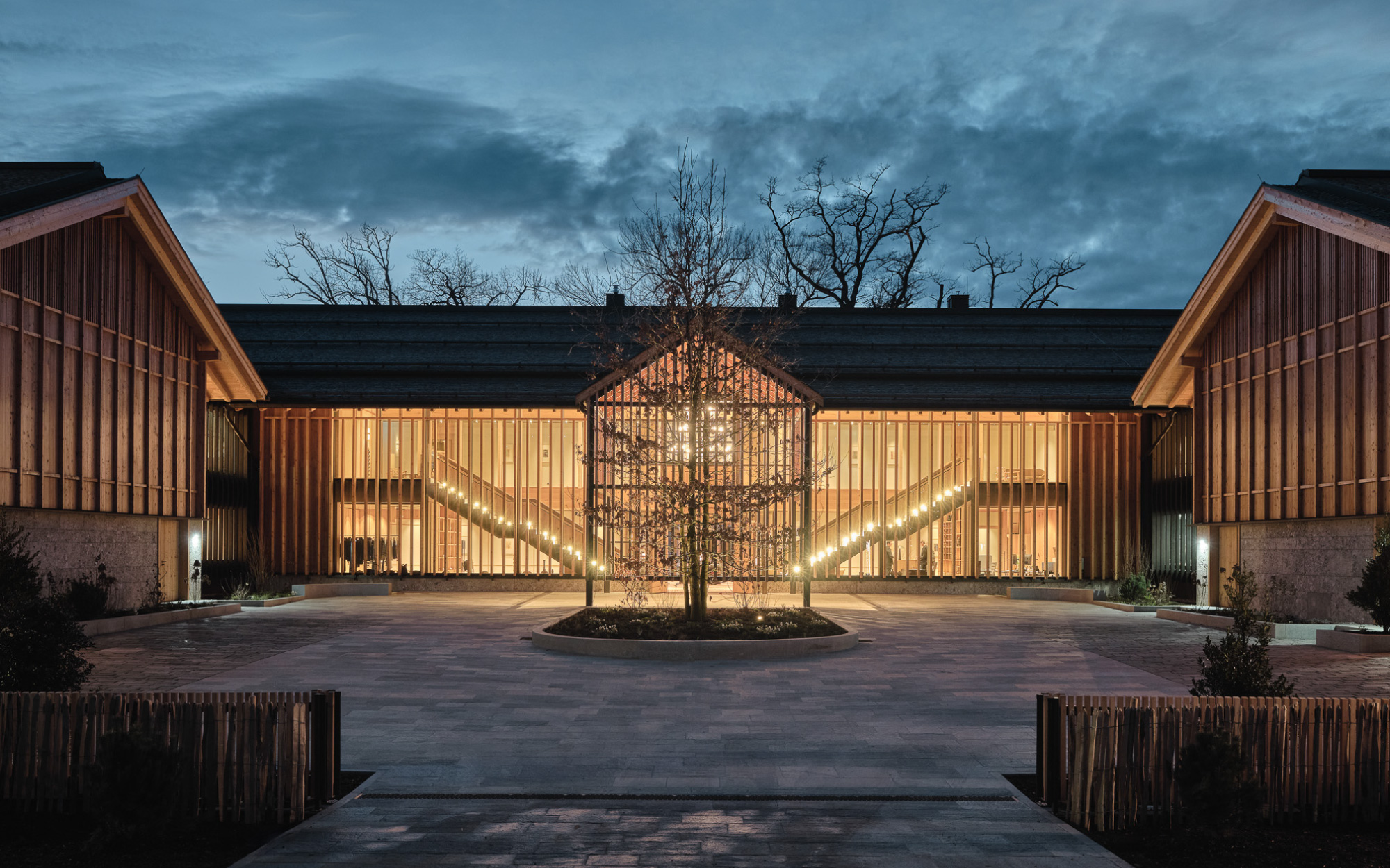 Larch clads the façades in a nod to local farm buildings, and Austrian spruce shapes the walls and roof trusses. (Image Credit: Elias Hassos)