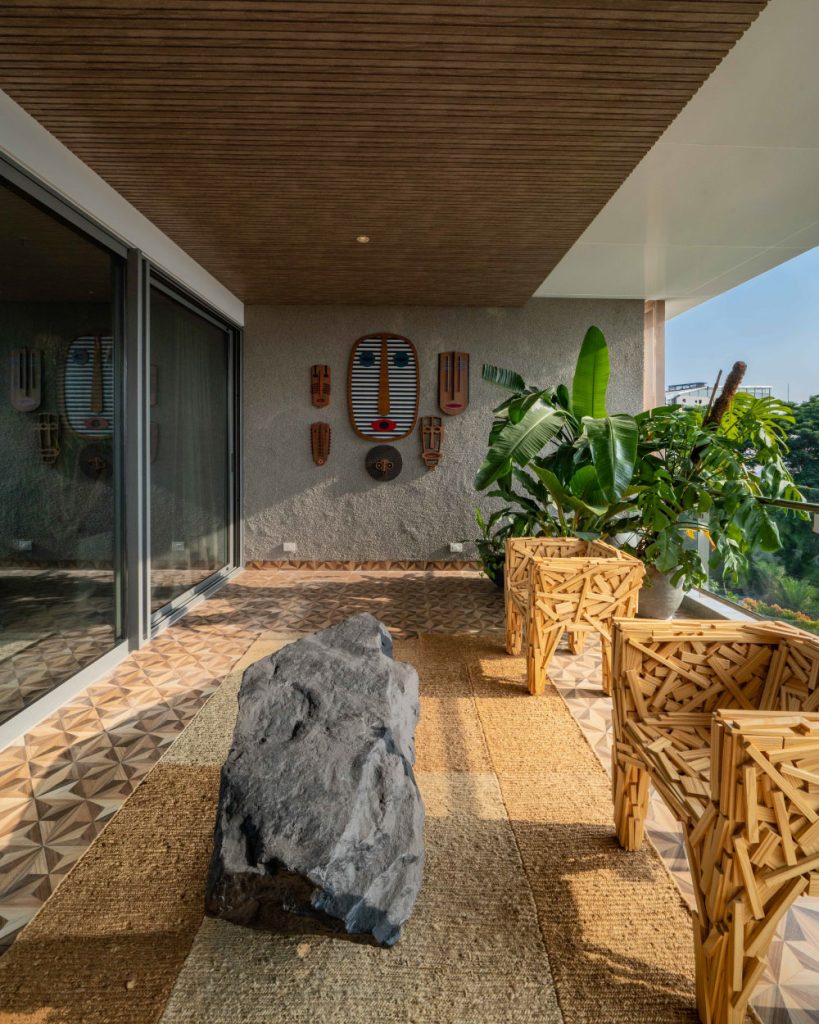 The balcony area of the showflat features greenery and sculptural chairs perfect for unwinding. (Image Credits: The World Experience Centre)