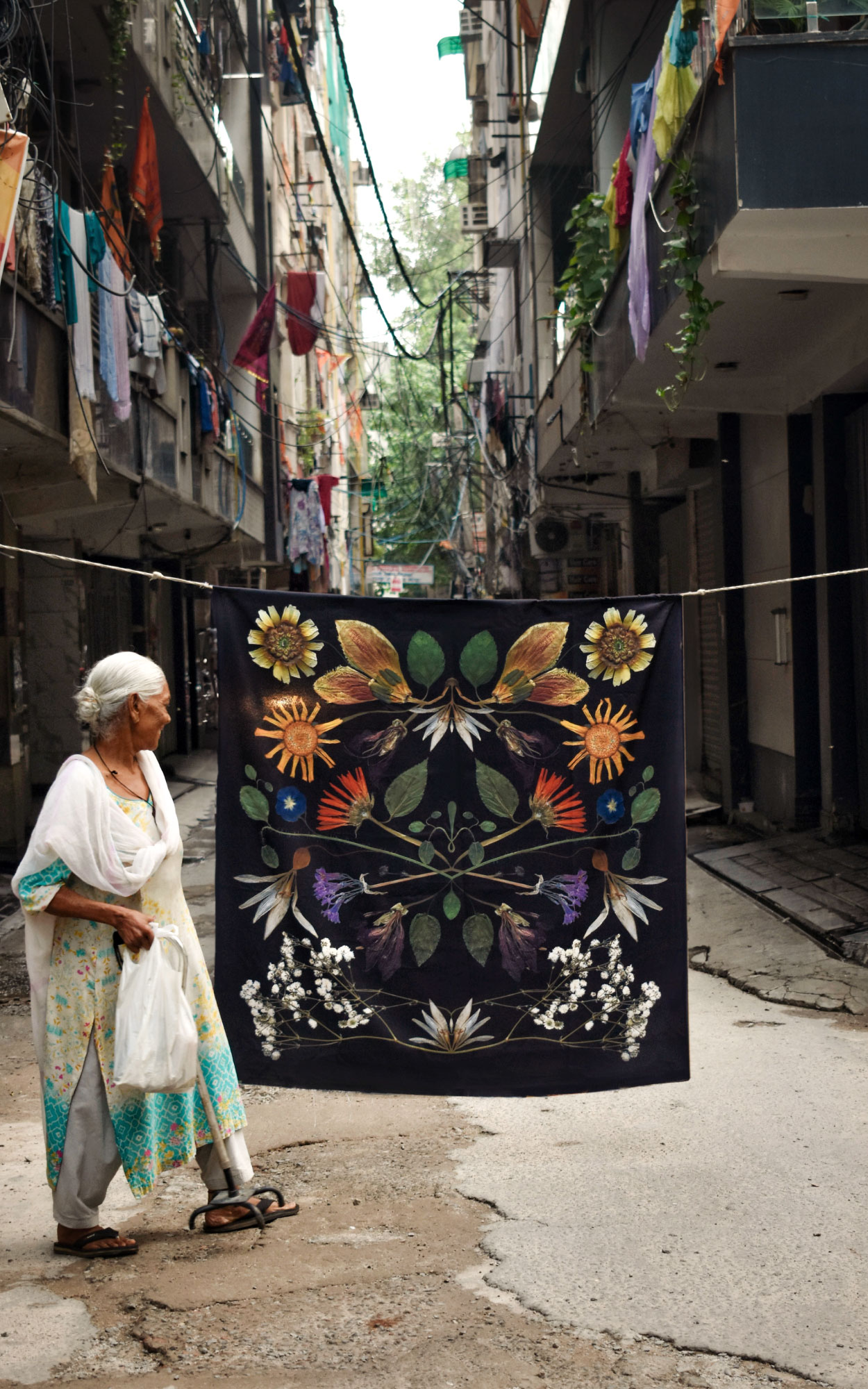 A ‘Civilisation’ is printed on upcycled canvas and installed in Delhi’s Rani Bagh, the artist’s childhood neighbourhood. Part of an ongoing public art series, it confronts urban forest inequity. Co-designed with residents. 4.5 ft x 4.5 ft (Image Courtesy: Kaanchi Chopra)