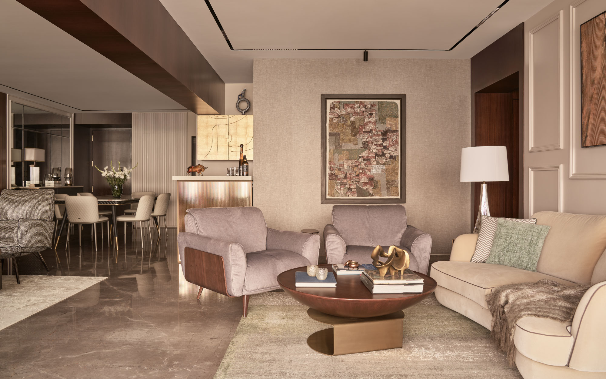 The living area features two living spaces and a dining nook with a dining table and sideboard customised by Tahiradas and dining chairs by Cattelan Italia from And More Stories. (Image Credits: Yadnyesh Joshi)