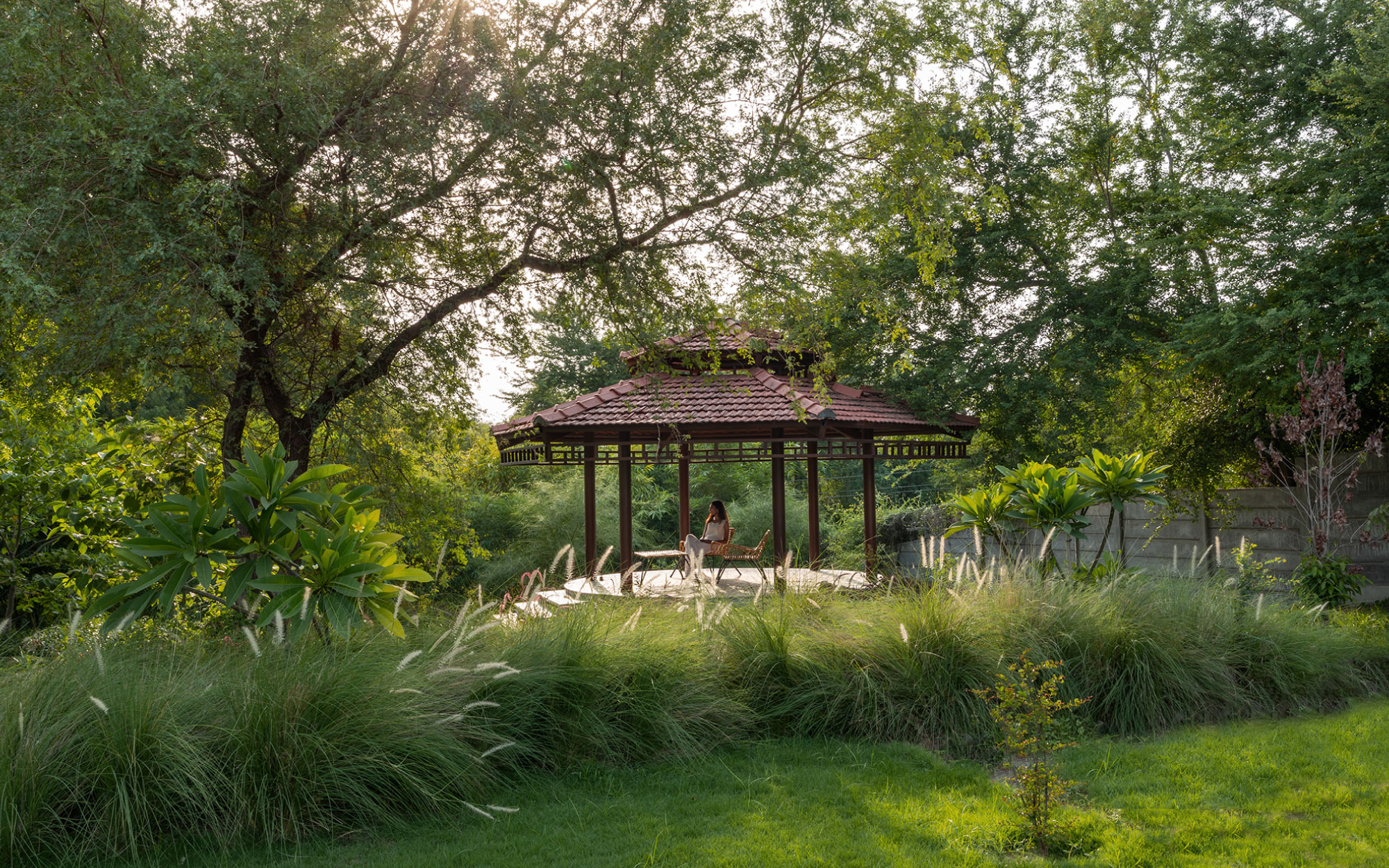Nestled in the orchard’s heart, the gazebo offers a tranquil spot for both self-reflection and gatherings. (Image Credits: Tejas Shah)