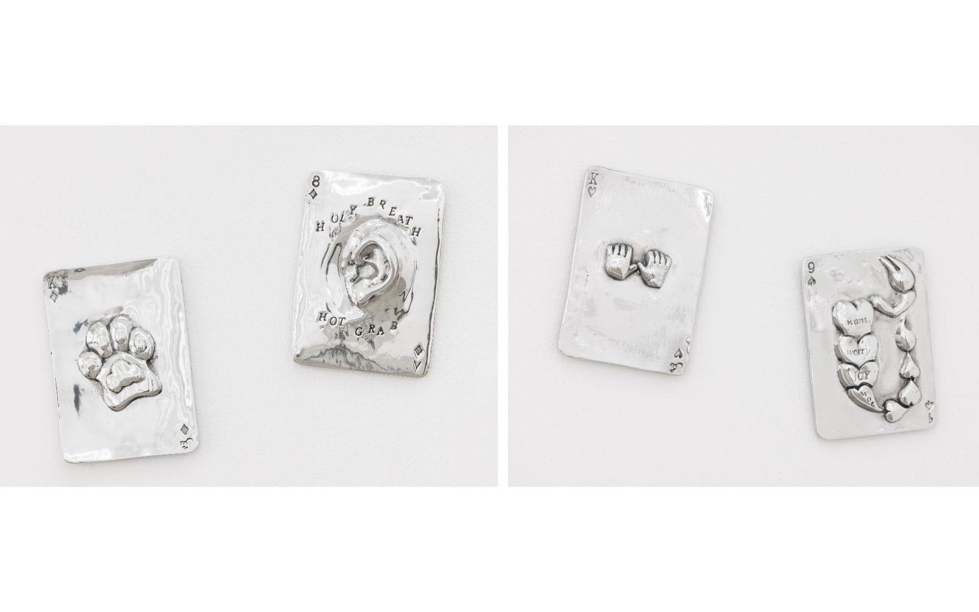 Left: Metaphysical Reunification—King of Diamonds & 8 of Diamonds; Right: Metaphysical Reunification—King of Hearts & 9 of Spades by Jala Wahid, aluminium, each 15 x 10.5 x 3 cm (Image Credits: the artist, Niru Ratnam, London, and Photographer Damian Griffiths)