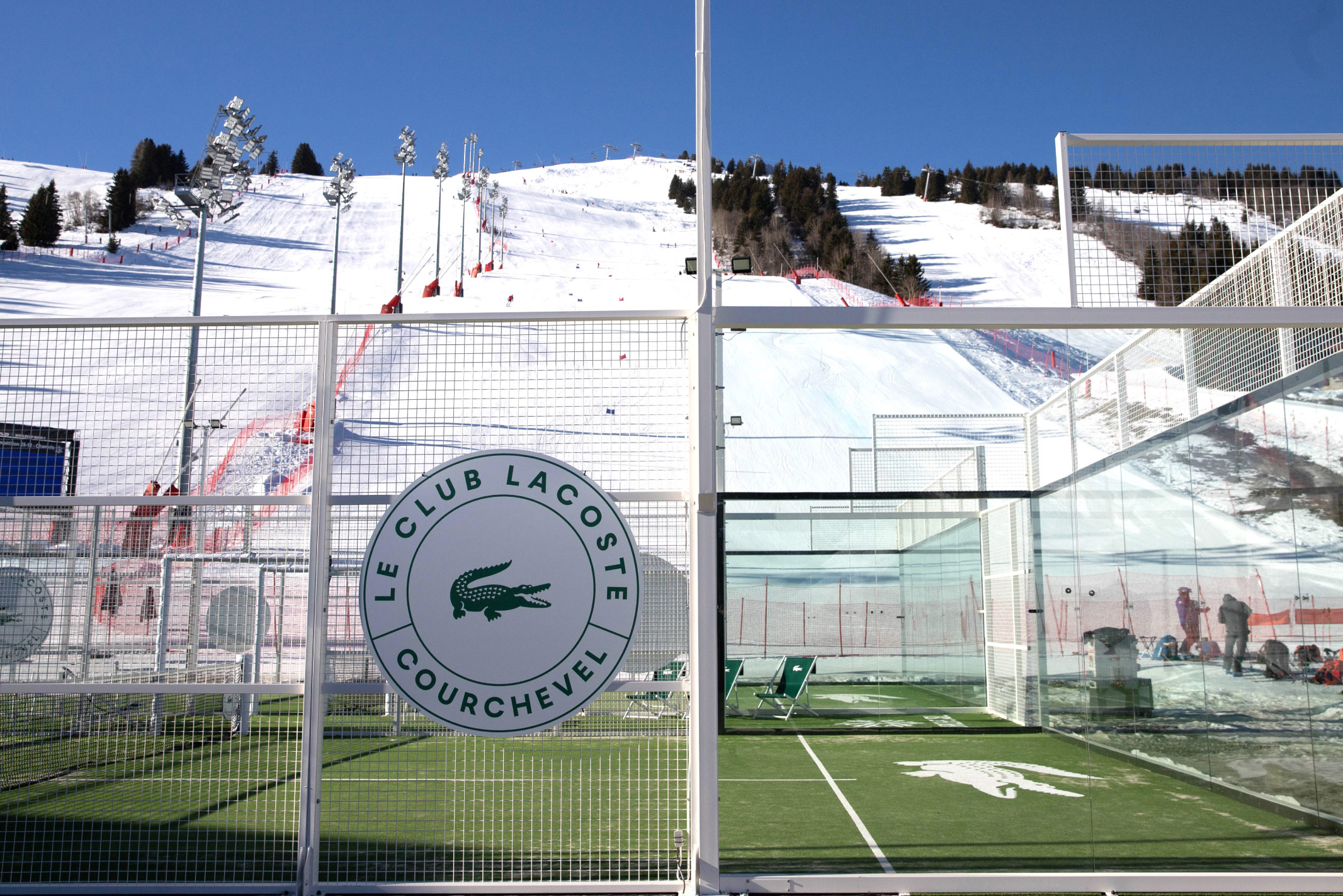 Vivid green surface cuts through the white landscape, offering a bold visual contrast that feels both luxurious and precise. (Image Credits: Arthur Dojat)
