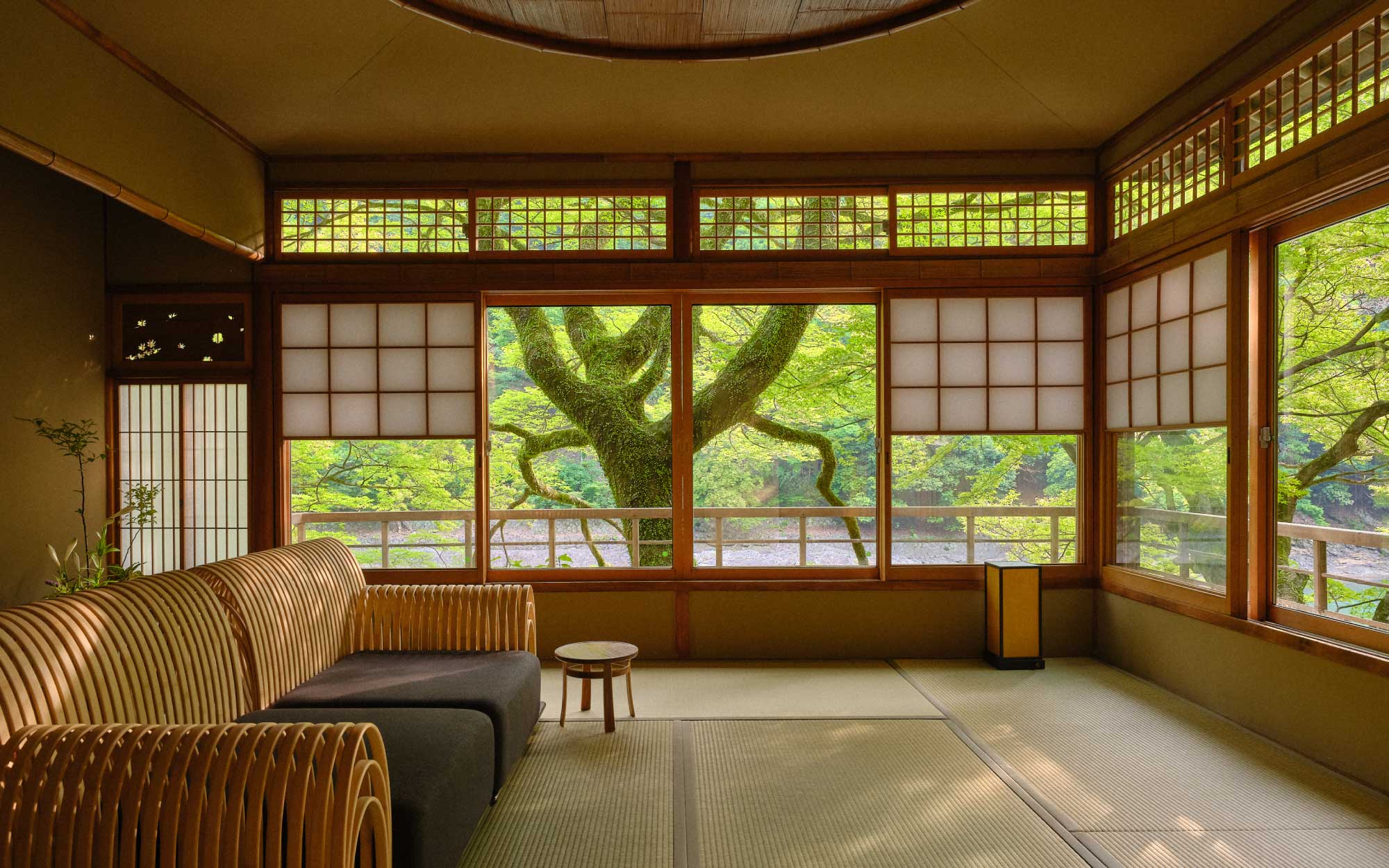 Expansive windows in every guest pavilion frame the gorge below, capturing a constantly evolving palette of seasonal colour. (Image Credit: Hoshino Resorts)