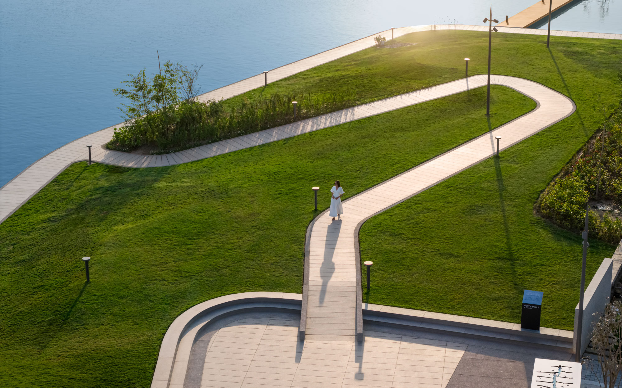 The walking trails meander gently through the landscape, inviting residents to slow down and rediscover the quiet luxury of unhurried movement. (Image Credits: Suryam Developers) 